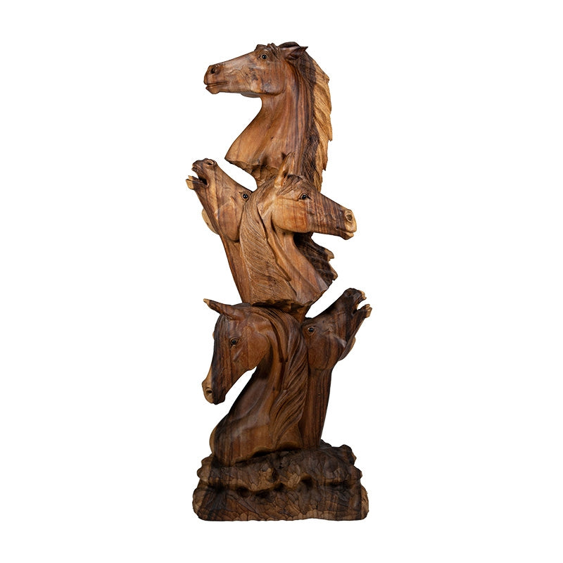 Wooden sculpture of five horses stacked on top of each other with a white background